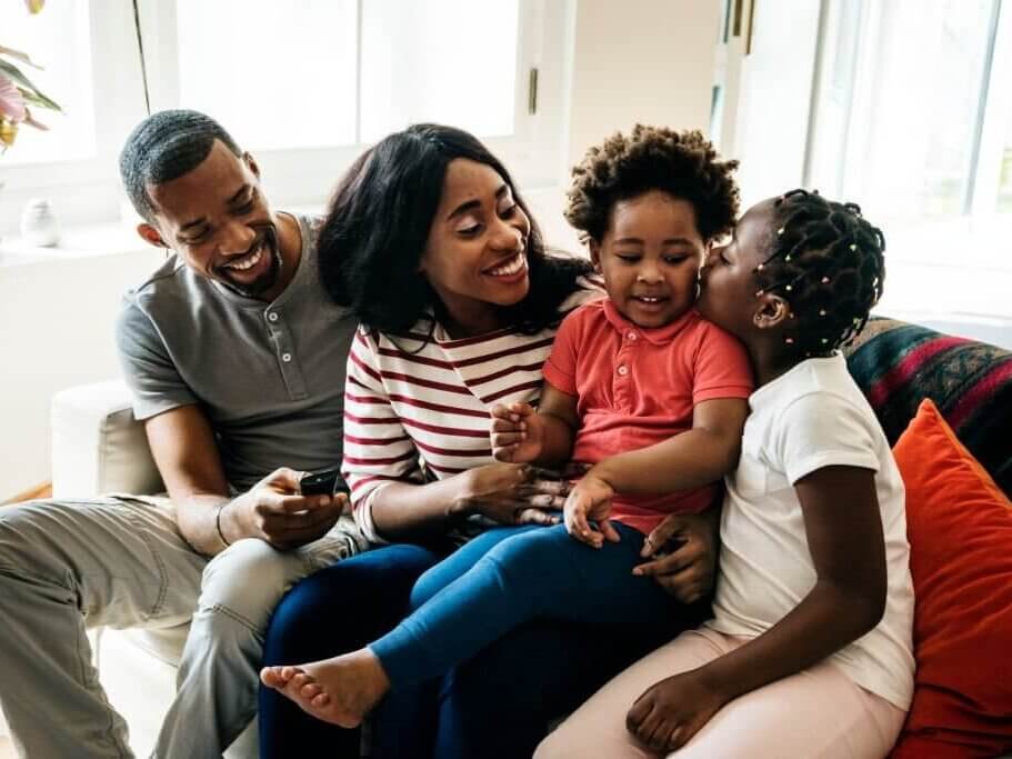 African family spending time together due to Window Tint Solutions